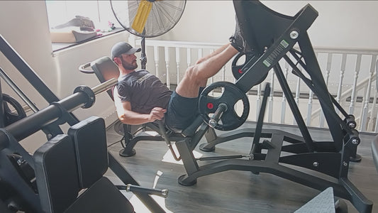 Leg press, plate loaded. Commercial gym equipment